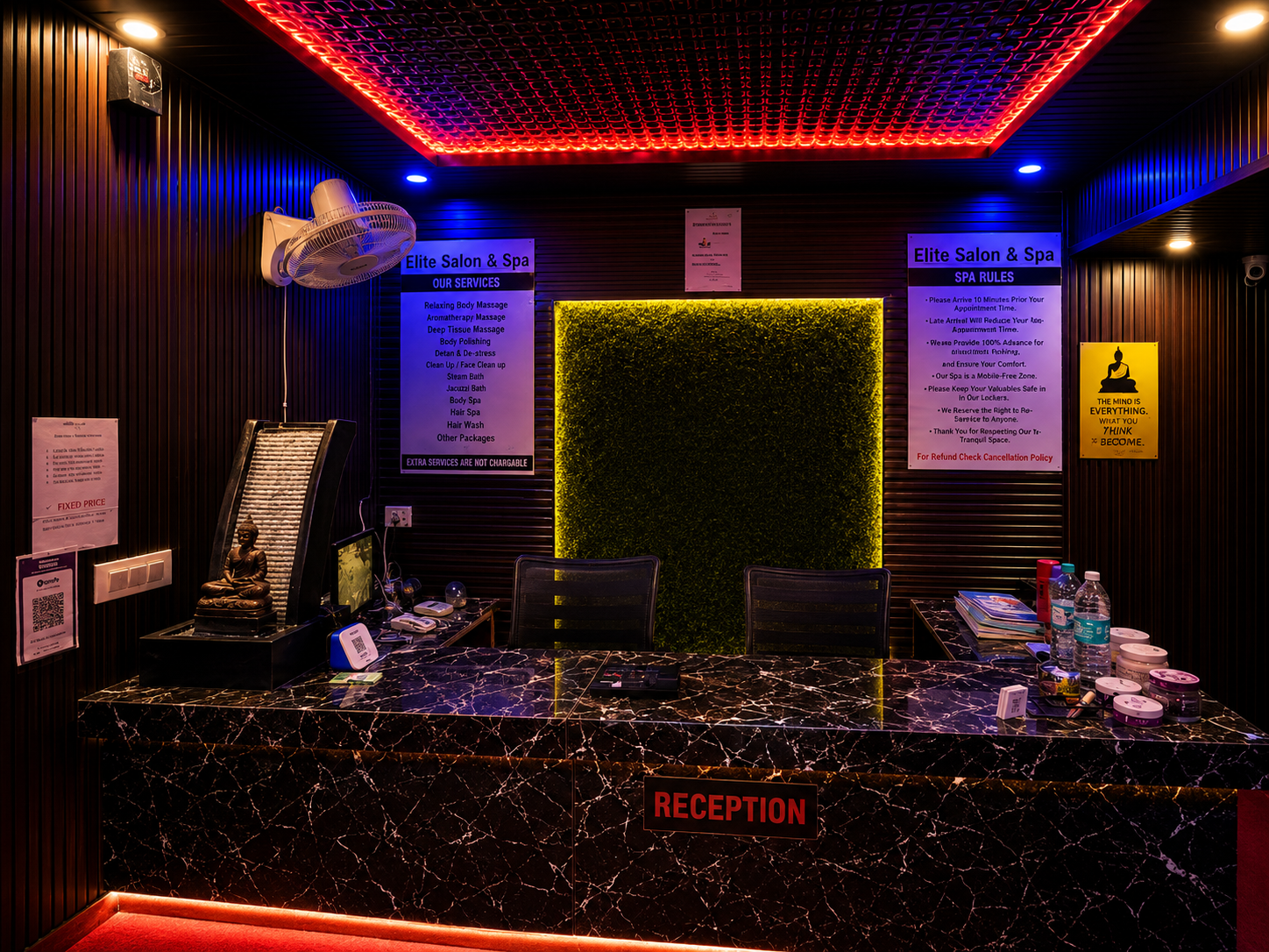 The Front Desk — Prices, timings and the cancellation policy are all on the wall behind reception.