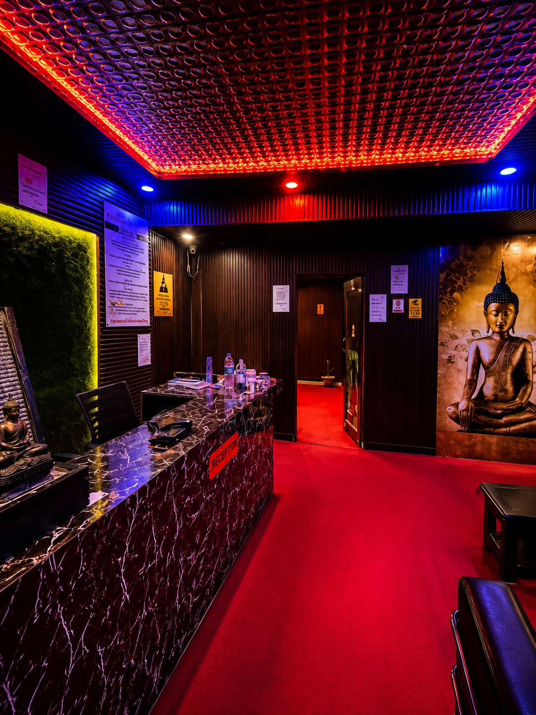 Reception — The desk you check in at, on the second floor of Kartikeya Tower.